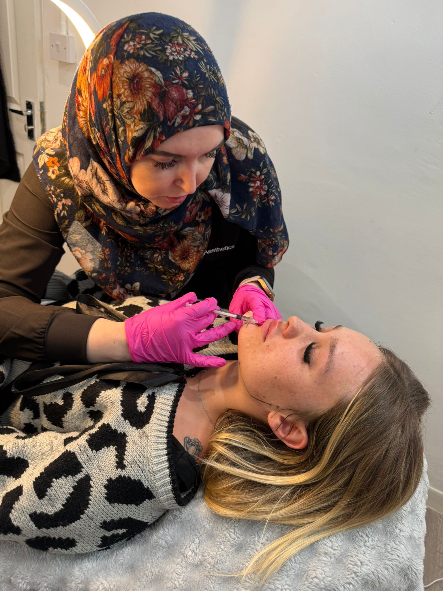 Asiyah performing a treatment at A&A Medical Aesthetics