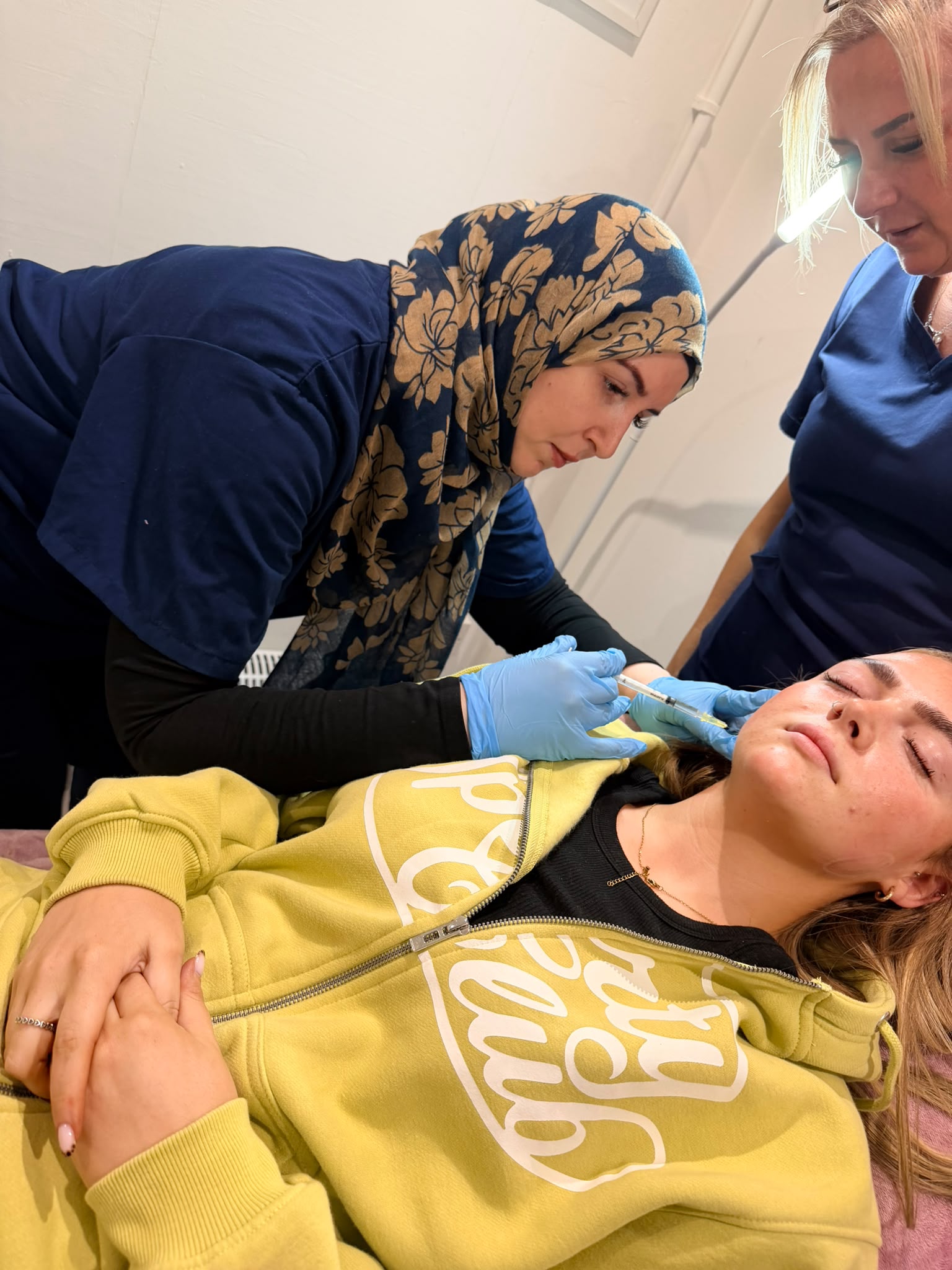Asiyah performing a treatment at A&A Medical Aesthetics